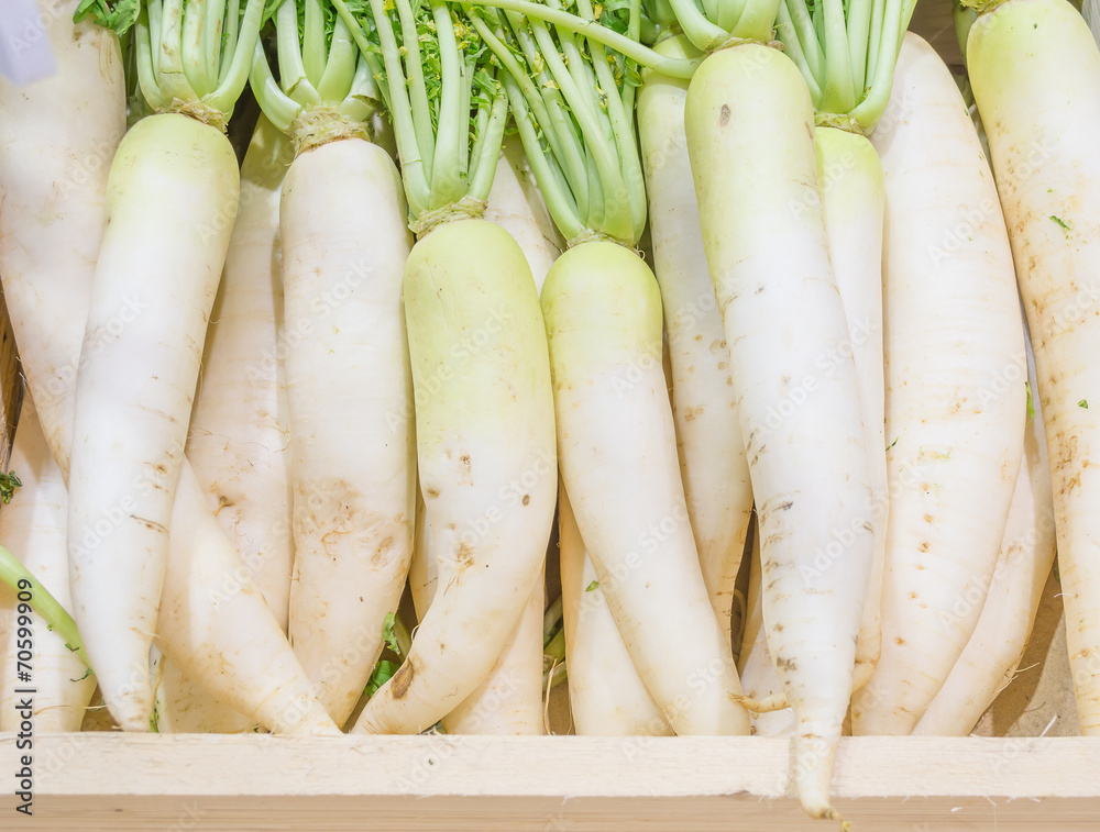 white radish harvested products on wooden planks white radish harvested products on wooden planks