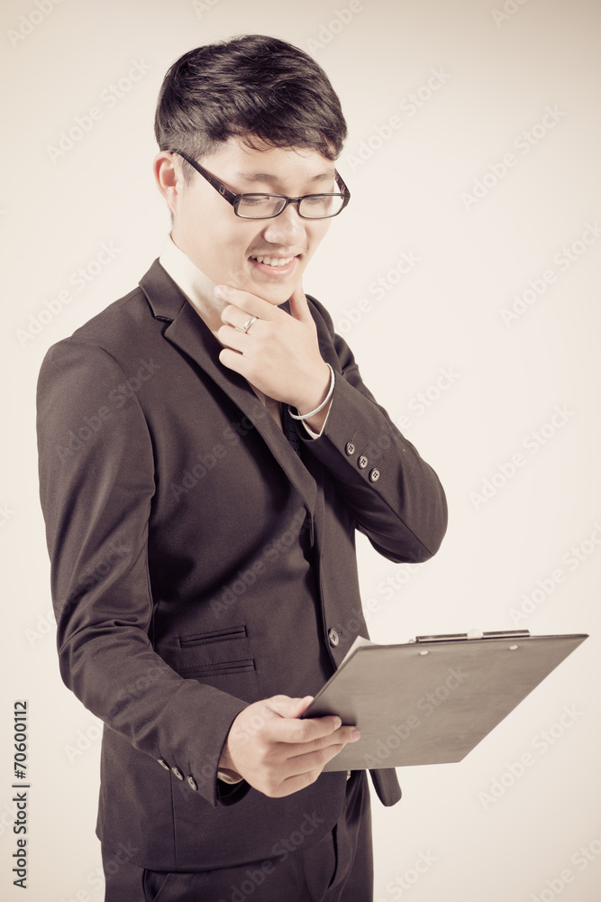 Successful young business man of Asian, full length portrait iso Successful young business man of Asian, full length portrait iso