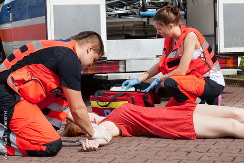 Young girl fainting in hot day