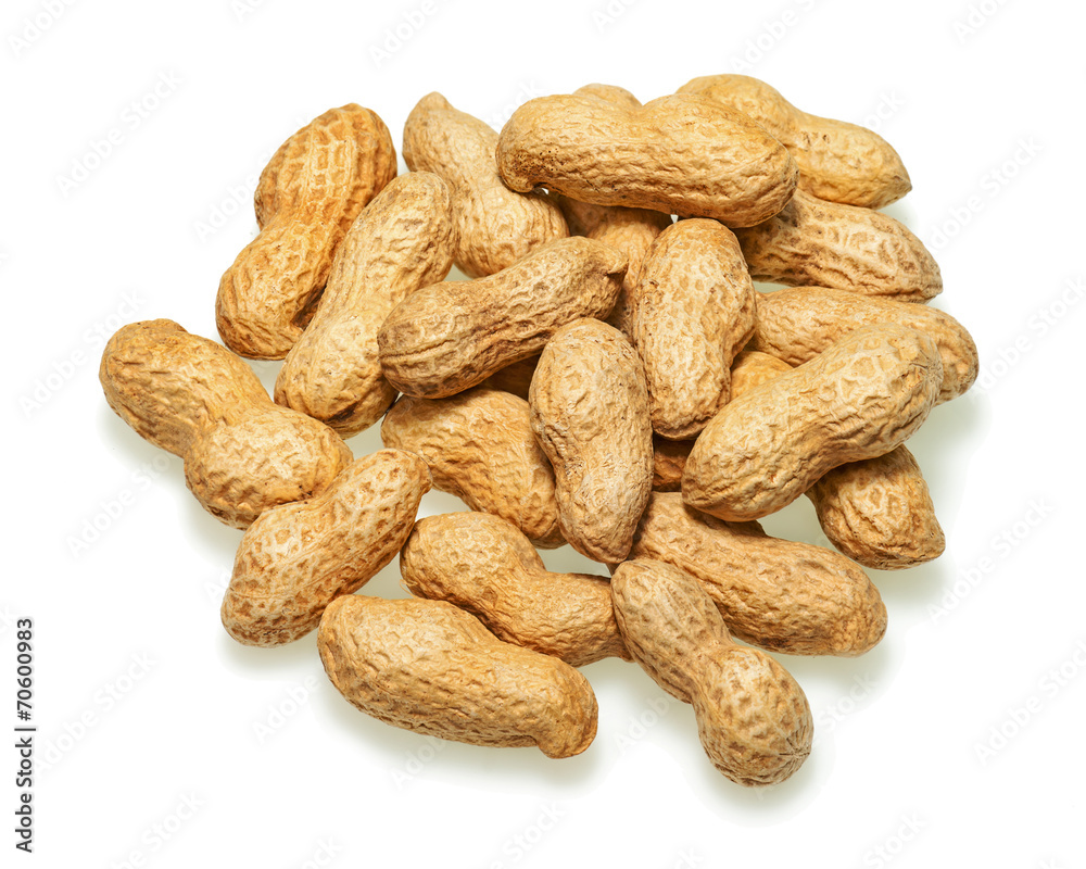 Pile of dry roasted peanuts isolated on white background. Pile of dry roasted peanuts isolated on white background.