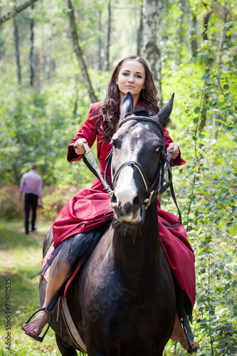 brunette girl on horse