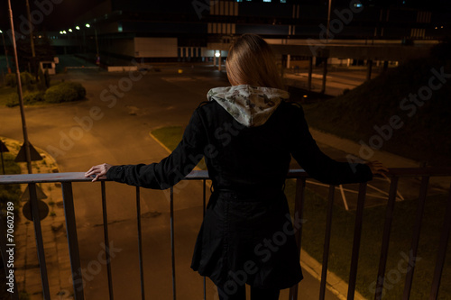 Girl on a bridge before suicide