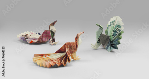 three bird origami banknotes walking © butenkow