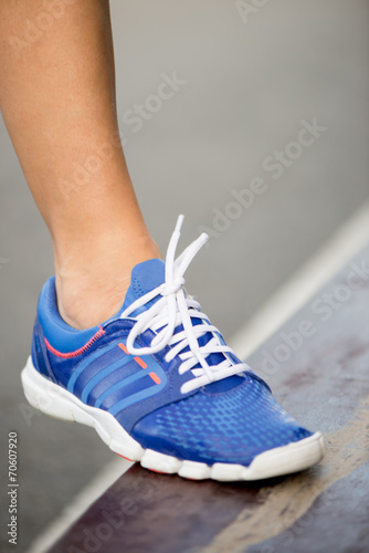 Runnning shoe on runner, close-up