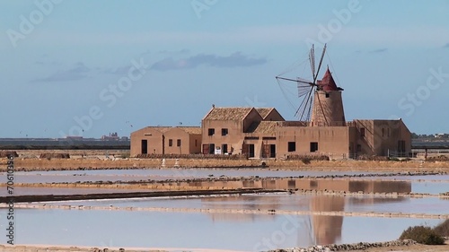 Ancient Windmills and salt pans at Mozia island, Sicily photo
