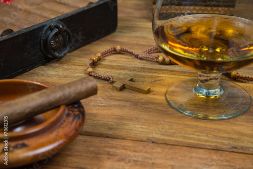 Cigars and Rum or alcohol on table © marcin jucha