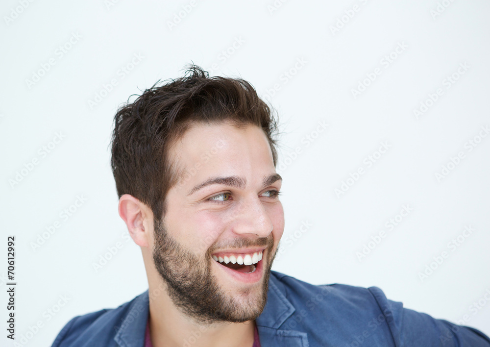 Obraz premium Cool guy with beard laughing on white background