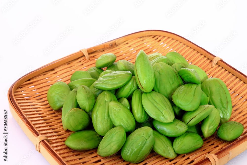 Tropical stinking edible beans in basket. (Parkia Speciosa) Tropical stinking edible beans in basket. (Parkia Speciosa)
