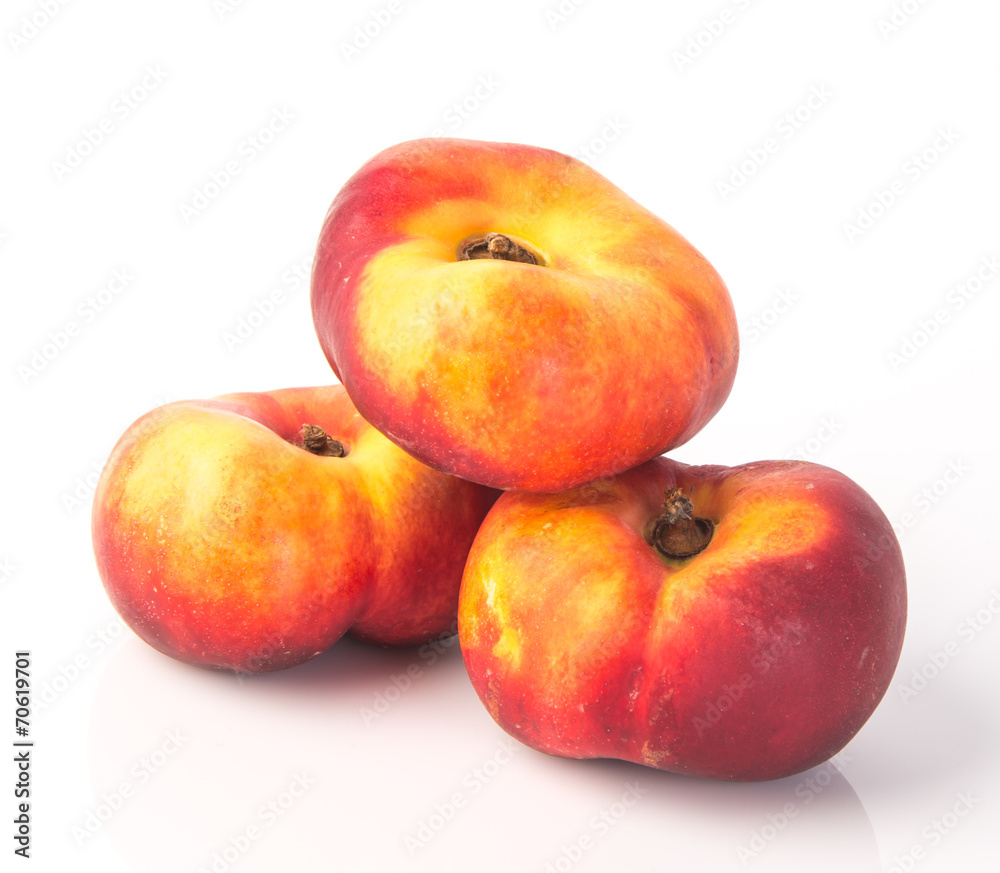 flat peaches (donut peaches) on a background flat peaches (donut peaches) on a background