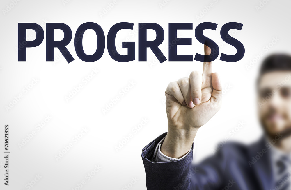 Business man pointing to transparent board with text: Progress Business man pointing to transparent board with text: Progress