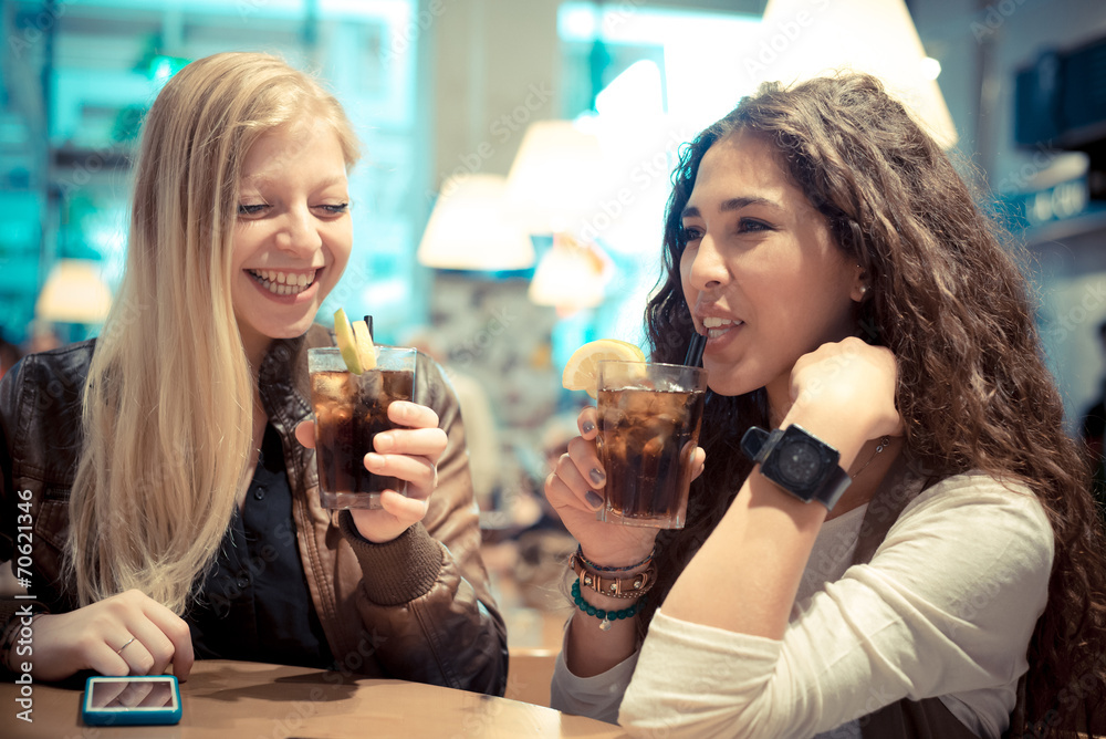 blonde and brunette beautiful stylish young women blonde and brunette beautiful stylish young women