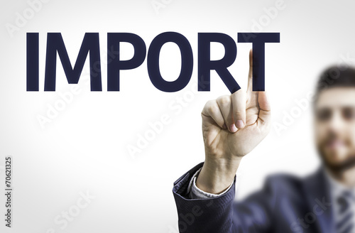 Business man pointing to transparent board with text: Import photo
