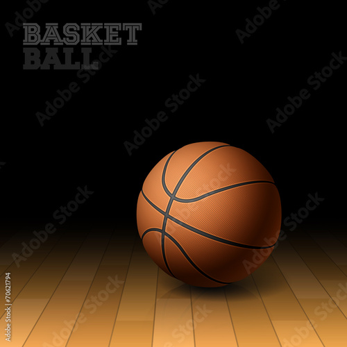 Basketball on a hardwood court floor