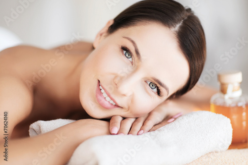 happy woman in spa salon