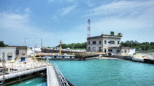 A lake freighter rises in a lock on the Welland Canal photo