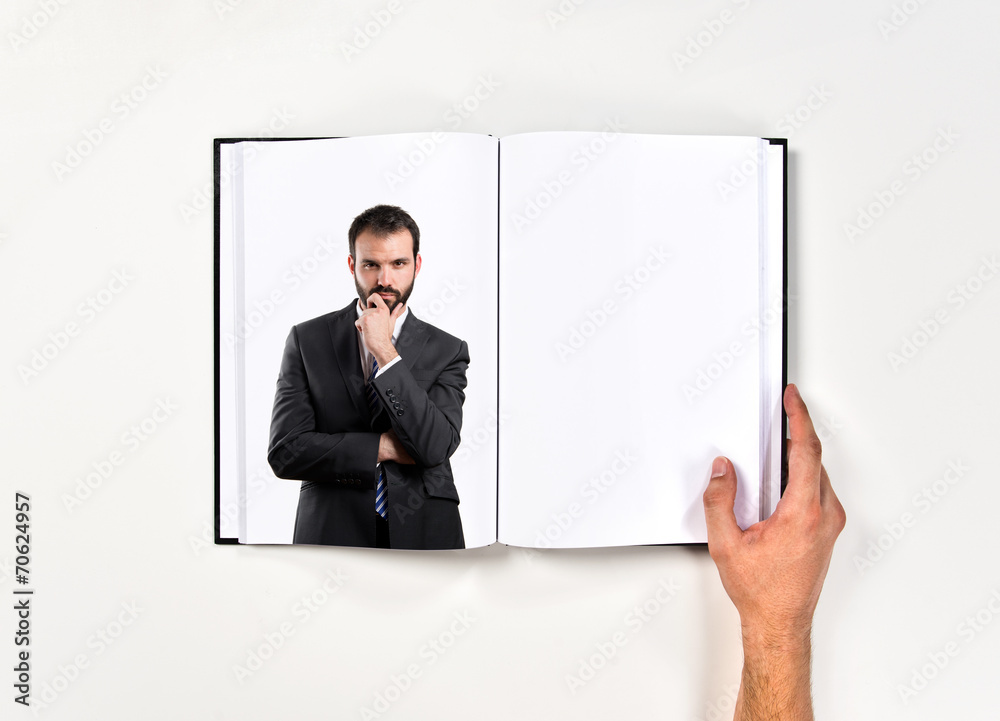 business man thinking printed on book business man thinking printed on book