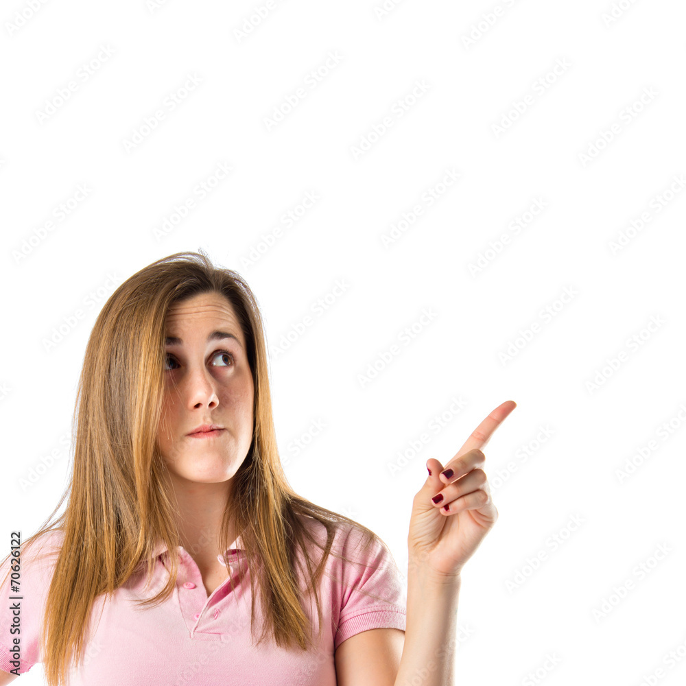 Girl thinking over isolated white background Girl thinking over isolated white background