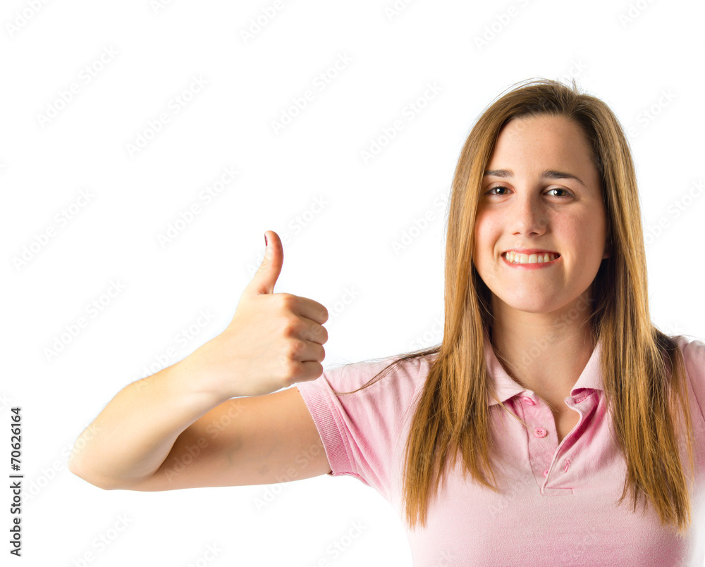 Girl with thumb up over white background Girl with thumb up over white background