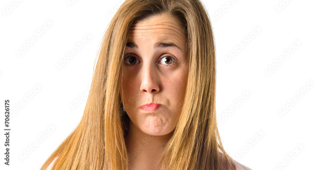Sad young girl isolated over white background Sad young girl isolated over white background