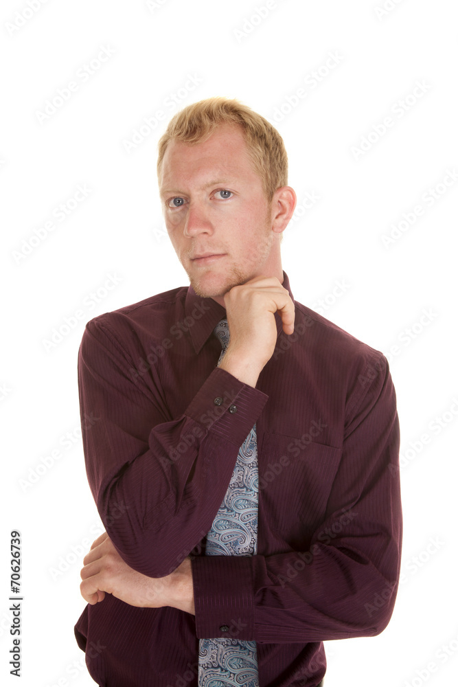 man in tie purple shirt portrait hand under chin serious man in tie purple shirt portrait hand under chin serious