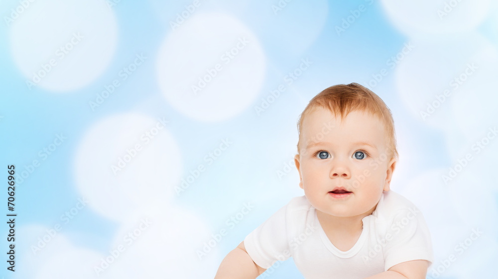 smiling baby lying on floor and looking up smiling baby lying on floor and looking up