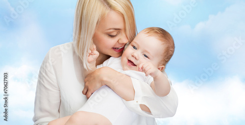 happy mother with smiling baby