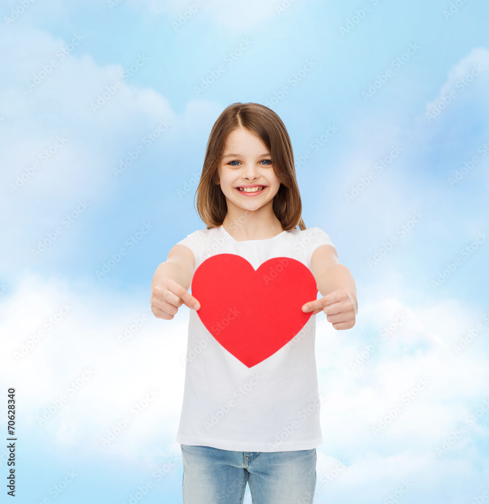 beautiful little girl sitting at table