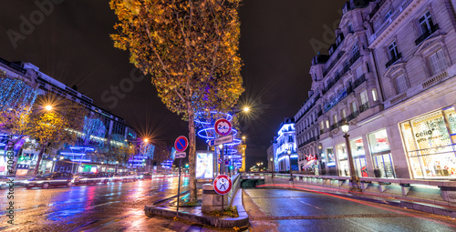 PARIS - DECEMBER 2, 2012: Lights of Champs Elysees at night. The