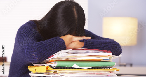 Japanese woman overwhelmed with work photo