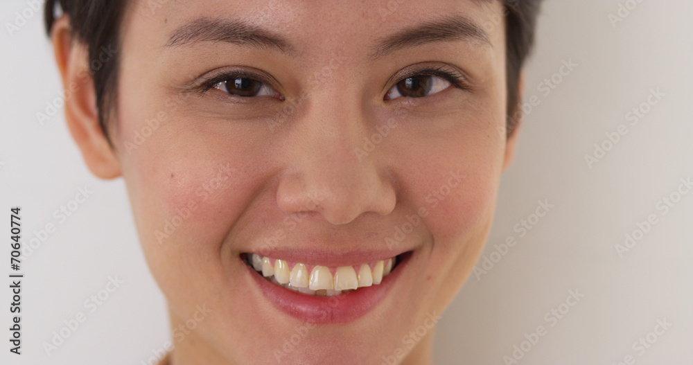 Close up of happy Chinese woman's face Close up of happy Chinese woman's face