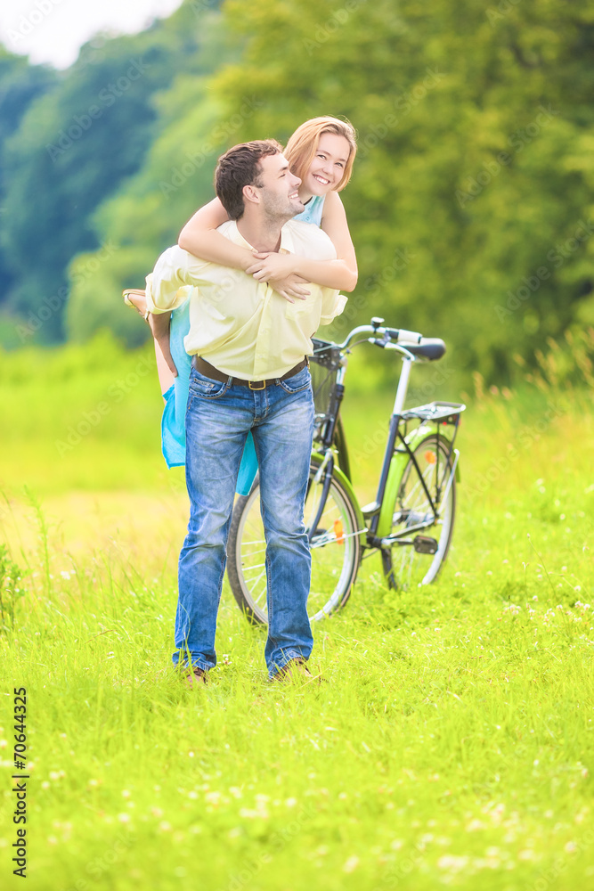 Happy Young Couple Piggyback Having Fun Outdoors Happy Young Couple Piggyback Having Fun Outdoors