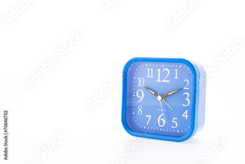 Blue clock isolated on white background