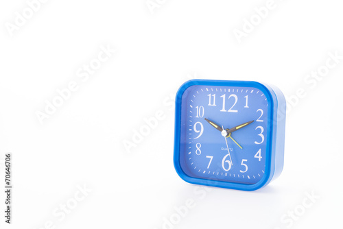 Blue clock isolated on white background