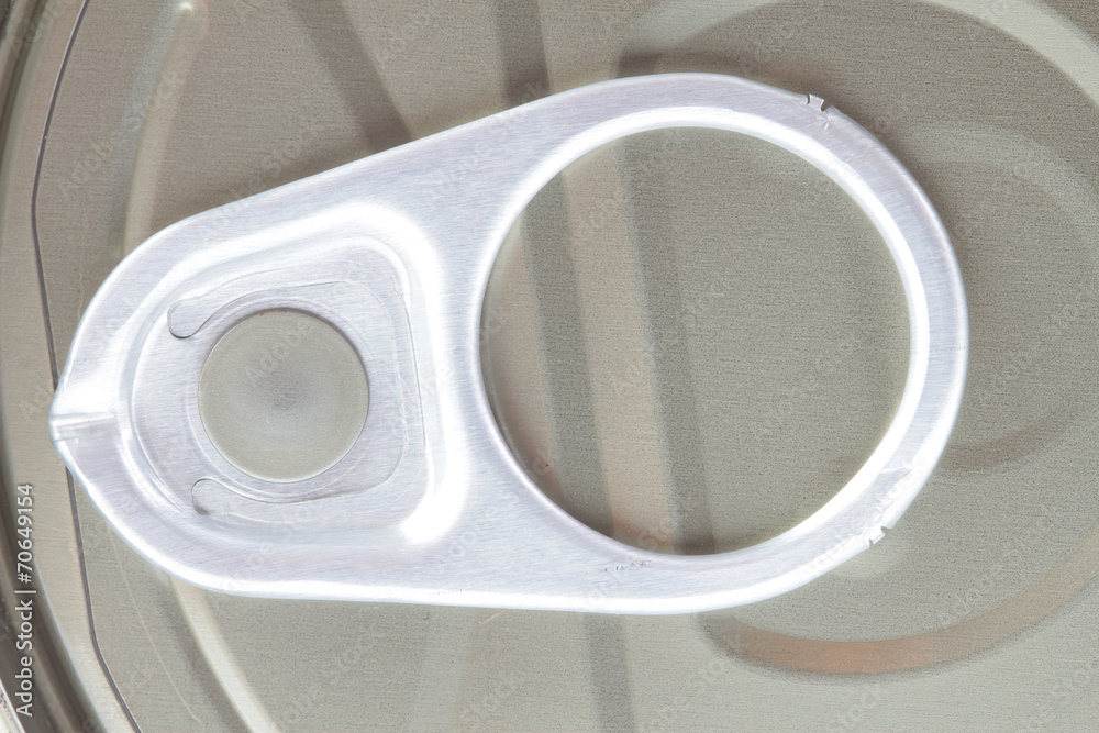 Fototapeta premium Top view of a can with key isolated on white background