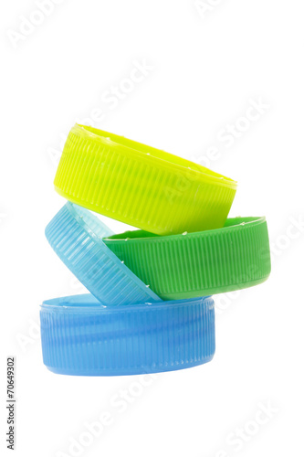 Plastic bottle caps isolated against a white background