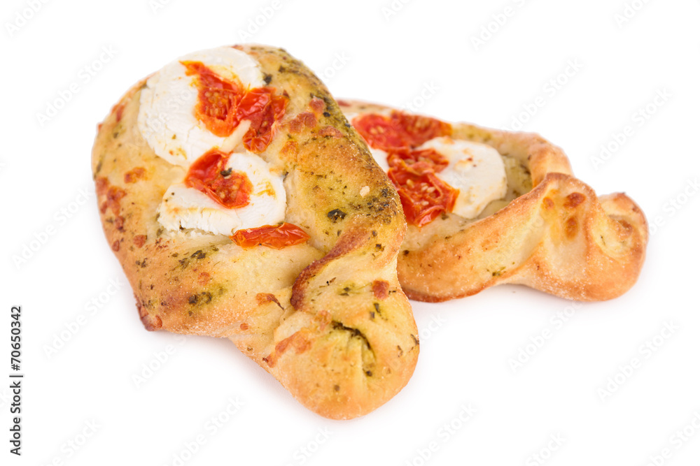 baked bread with cheese, tomato and pesto sauce baked bread with cheese, tomato and pesto sauce