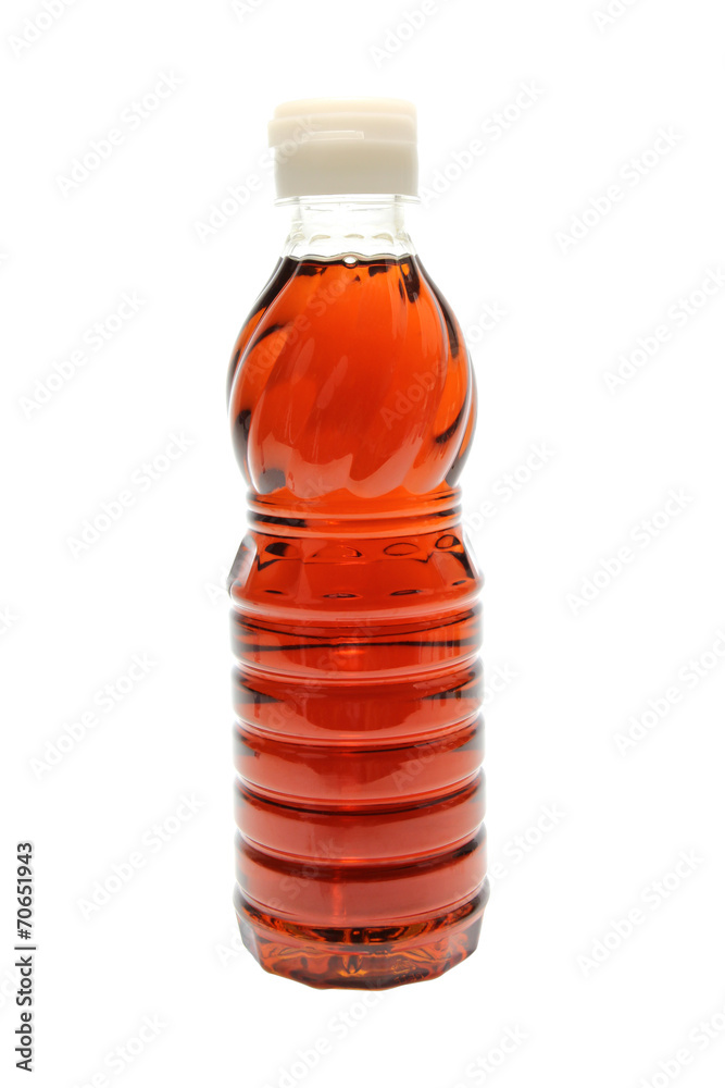 Fish sauce in bottle isolated on white background Fish sauce in bottle isolated on white background