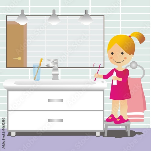 Niña lavándose los dientes