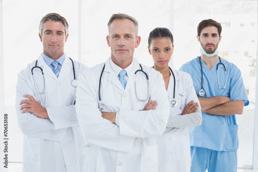 Medical team looking at camera Medical team looking at camera