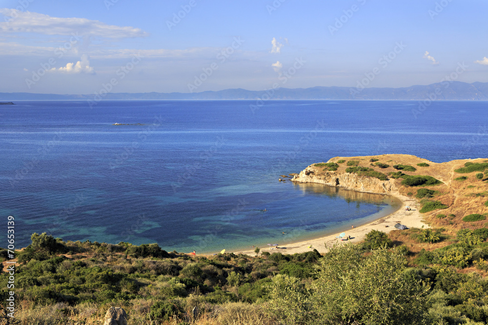 Wild sandy beach in the beautiful bay of the Aegean Sea.