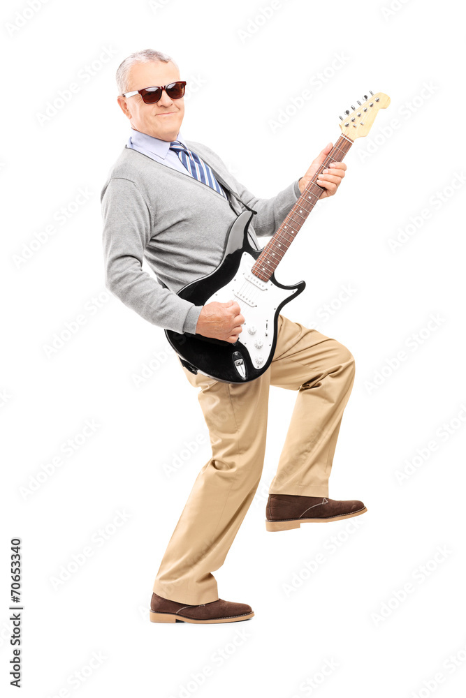 Cool senior playing an electric guitar Cool senior playing an electric guitar