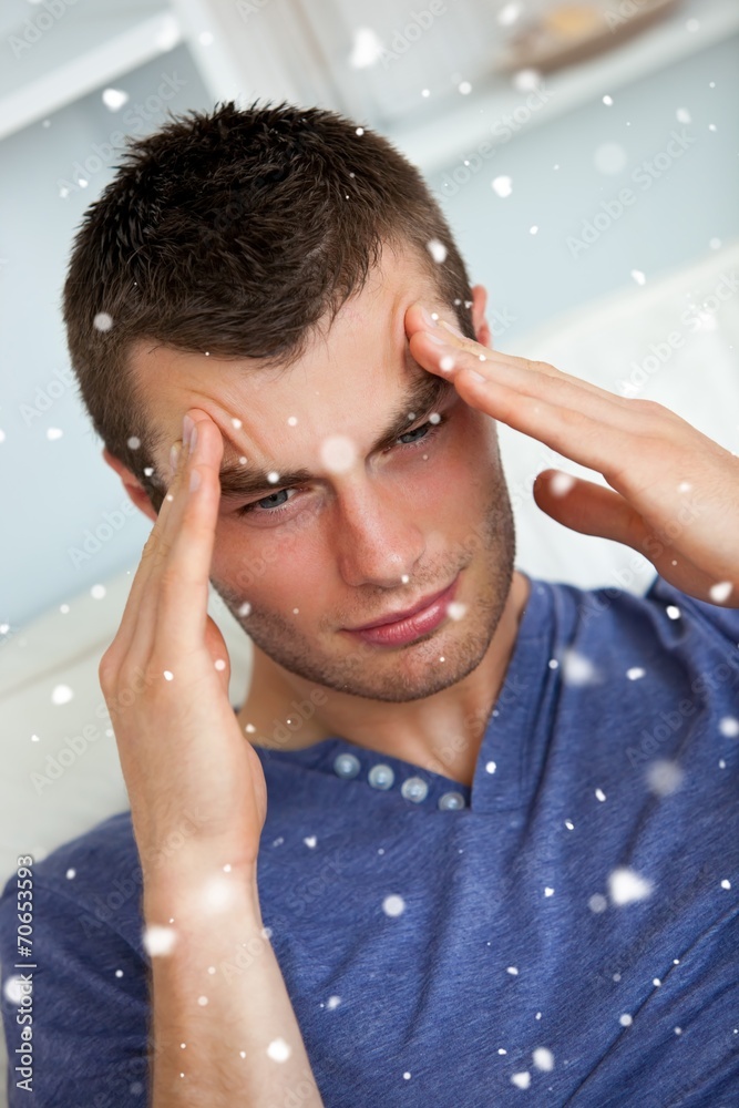 Depressed man having a headache Depressed man having a headache