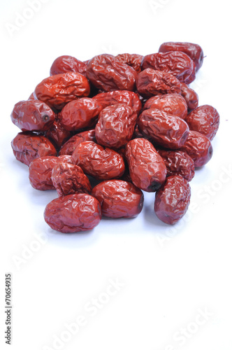 Pies of ripe jujubes isolated on white background. Traditional Chinese medicine.