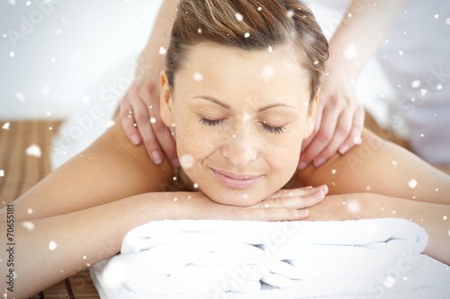 Relaxed woman enjoying a back massage