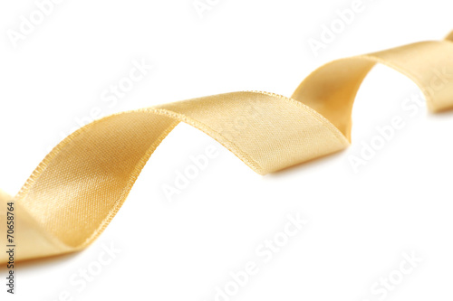 Golden ribbon isolated on white