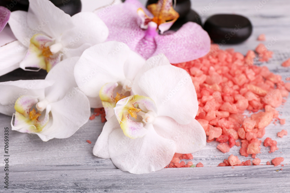 Colorful tropical orchid flowers and spa stones