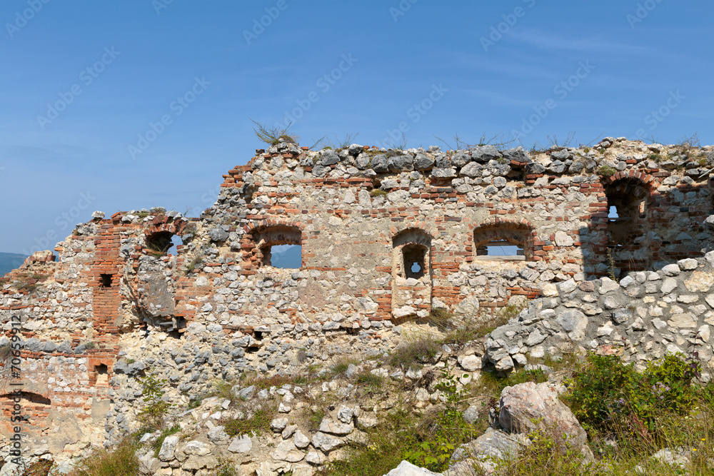 Detail of destroyed ruined walls of medieval Rasnov citadel in R