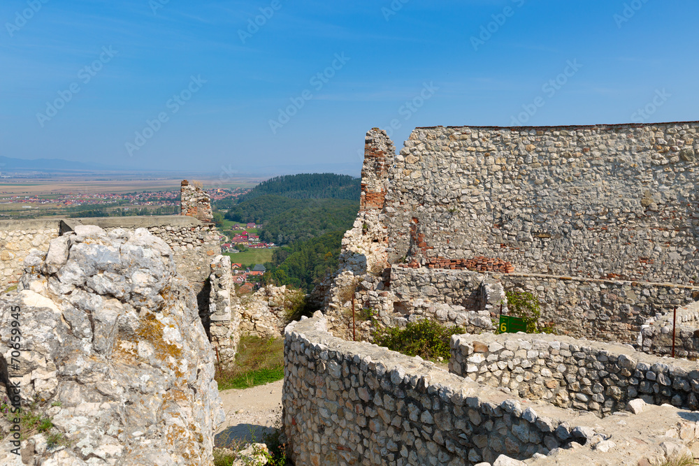 Detail of destroyed ruined walls of medieval Rasnov citadel in R
