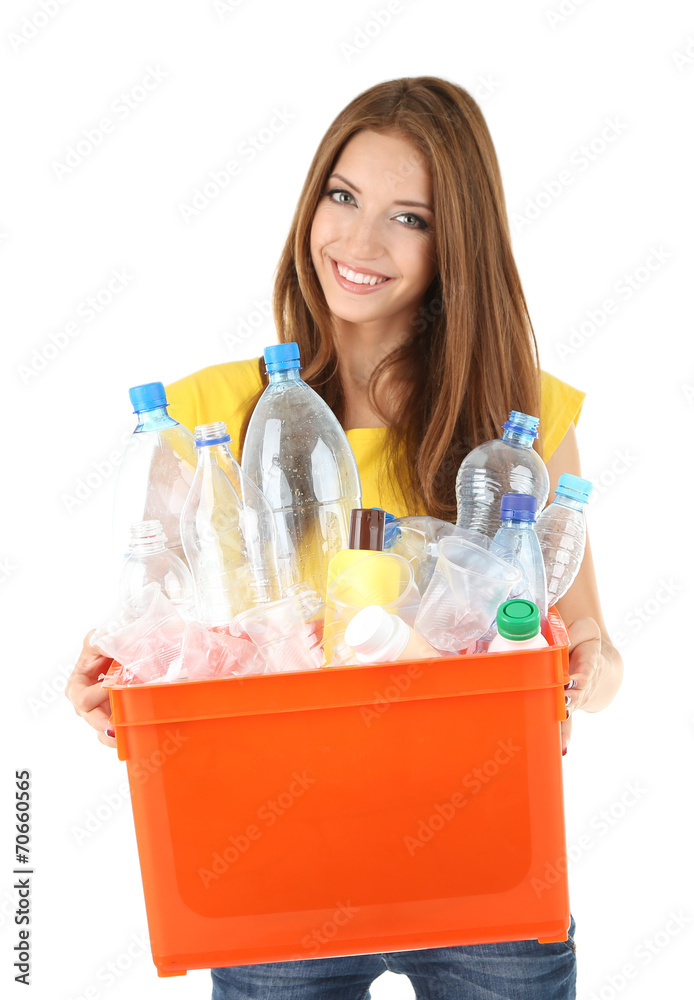 Young girl sorting plastic bottles isolated on white Young girl sorting plastic bottles isolated on white