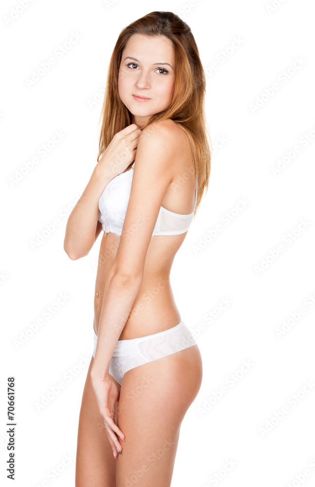 Beautiful shy slender girl in lingerie Photos | Adobe Stock